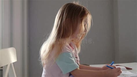 Blonde Kid Girl School Pupil Studying Online From Home Watching Web Art Class Lesson Or