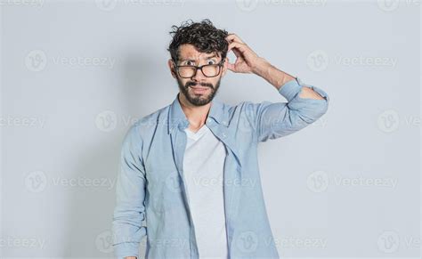 Confused Person Scratching His Head On Isolated Background Handsome