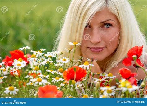 Beautiful Attractive Blonde Woman Portrait With Meadow Flowers Soft Focus Stock Image Image