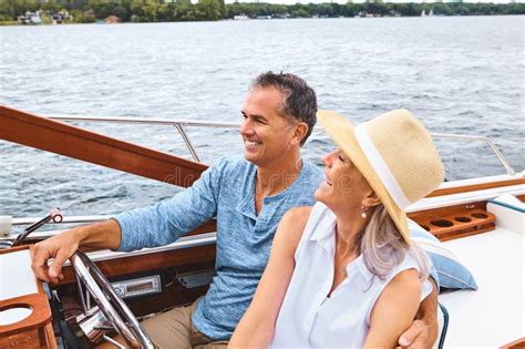 Life Is One Luxurious Boat Ride A Mature Couple Enjoying A Relaxing