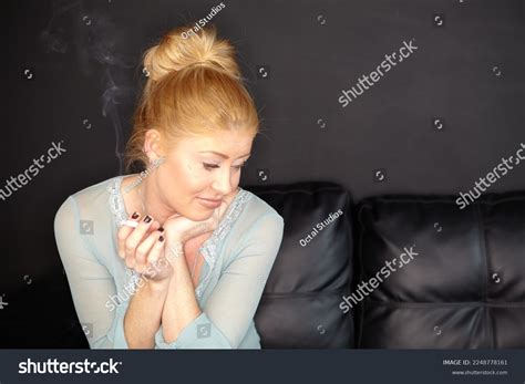 Close Portrait Blonde Woman Smoking Cigarette Stock Photo Shutterstock