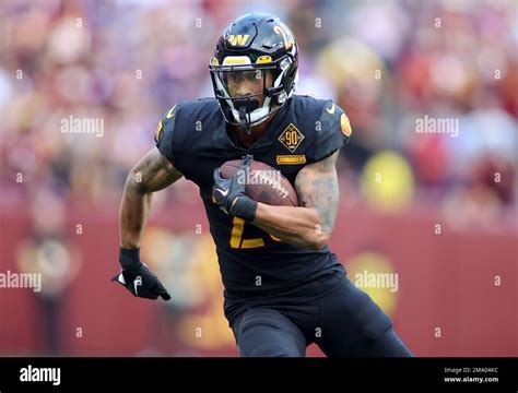 Washington Commanders Cornerback Benjamin St Juste Runs During An