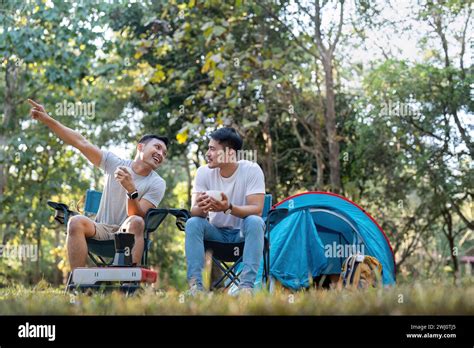 Male Gay Couple Asian Traveling With Tent Camping Outdoor And Various Adventure Lifestyle Hiking