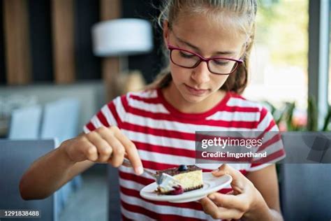 People Eating Cheesecake Photos And Premium High Res Pictures Getty
