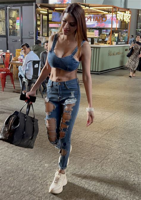 Sherlyn Chopra’s Hot Chic Look In Blue Denim At Mumbai Airport - Filmibeat