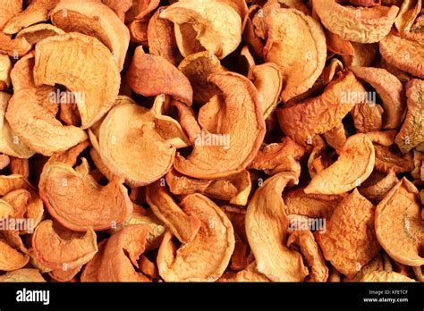 Heap Of Dried Apple Slices Closeup Background Stock Photo Alamy