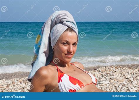Enjoying The Sun Stock Photo Image Of Pebble Body Bikini