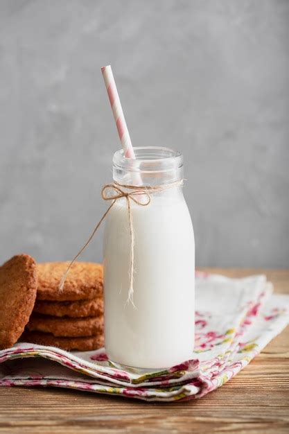 Free Photo Milk In Bottle With Straw