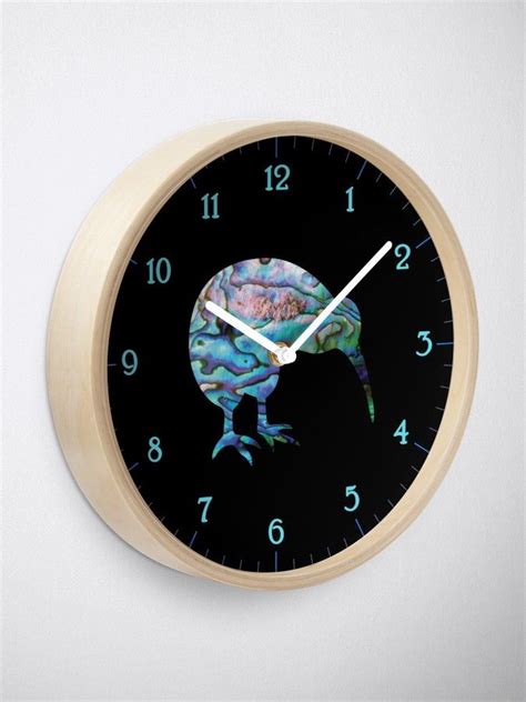 A Clock With An Image Of A Kiwi On It S Face And Hands