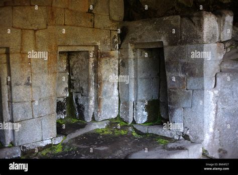 The Temple of the Moon in a cave beneath the peak of Huayna Picchu at the ancient Inca ruins of ...