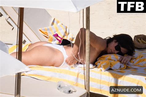 Charlize Theron Sexy Seen Flashing Her Nude Tits At The Beach In Tuscany Aznude