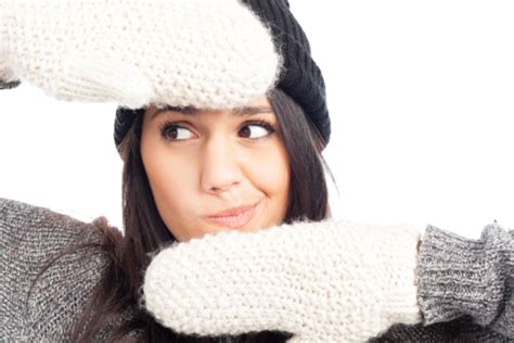 Beautiful Brunette Lady Wearing A Warm Wool Hat Cozy Sweater And Gloves With A Radiant Smile