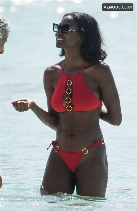 Mouna Traore Sexy In A Bright Red Bikini As She Enjoyed Some Fun In The Sun On Christmas Day In