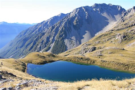 A Small Lake On A Mountain In The Nelson Lakes National Park Getaway