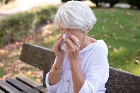 Mature Woman Blows Her Nose Stock Photos Free Royalty Free Stock Photos From Dreamstime