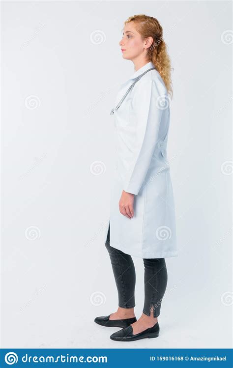 Full Body Shot Profile View Of Beautiful Blonde Woman Doctor Stock