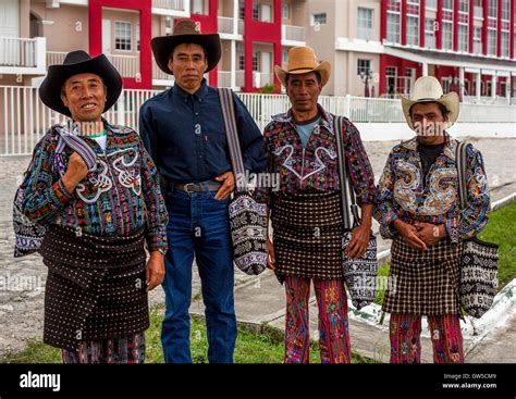 4 Males dressed in traditional clothing Flores Guatemala Stock Photo ...