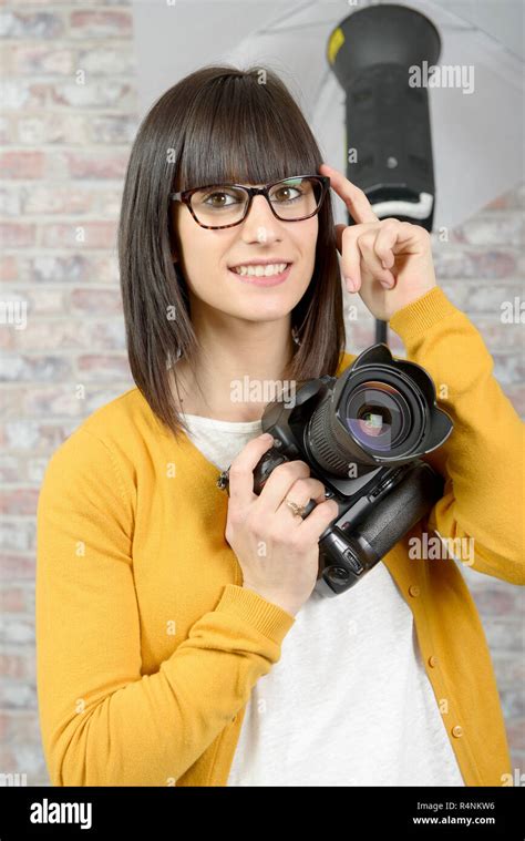 Attractive Brunette Woman With Photo Camera Stock Photo Alamy