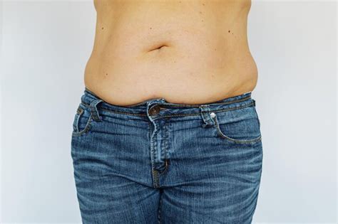 Premium Photo Overweight Woman Showing Fat Belly