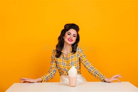 Inspired Pinup Girl Posing With Glass Of Cocktail Studio Shot Of Graceful Brunette Woman With