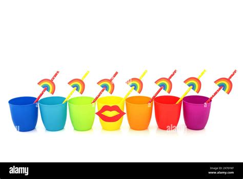 Rainbow Drinking Cups With Lips And Eco Friendly Paper Straws On White