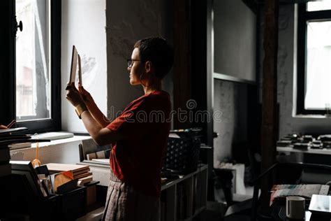 European Brunette Woman Working With Interior Samples In Office Stock Photo Image Of Design