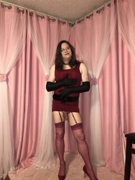 Joanie A Mature Tv Poses In Her Red Pencil Dress Photo Ashemaletube