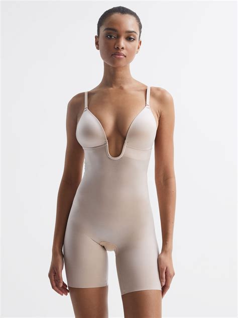 Spanx Shapewear Firming Plunge Low Back Mid Thigh Bodysuit In Champagne Reiss