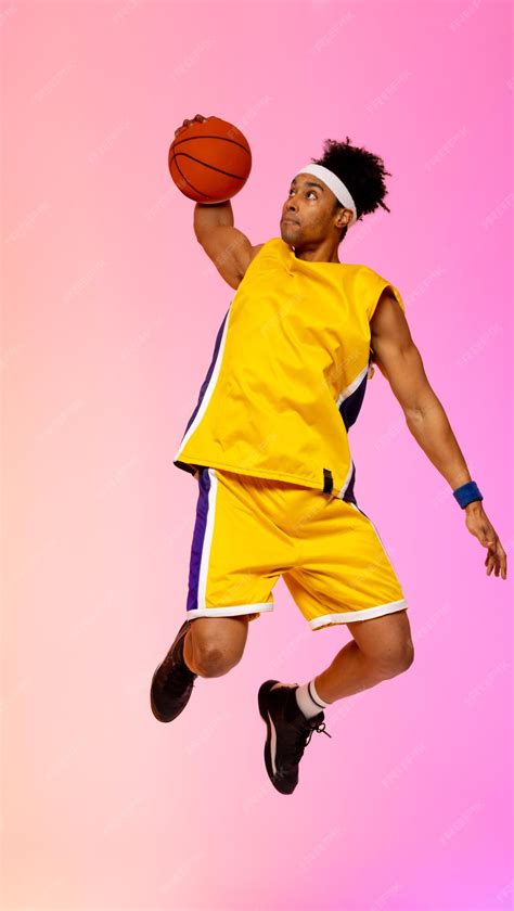 Premium Photo Image Of Biracial Basketball Player Jumping In The Air