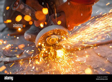 Angular Grinding Machine Cuts Metal With Sparks Stock Photo Alamy