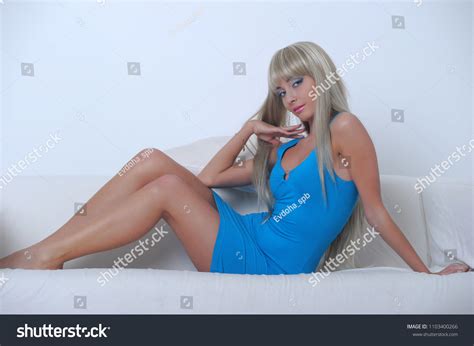 Sexy Blonde Blue Dress Sitting On Stock Photo Shutterstock
