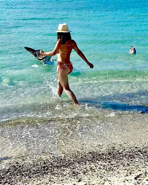 Salma Hayek 57 Shows Off Her Incredible Figure In Tiny Red Bikini As She Plays In Water During