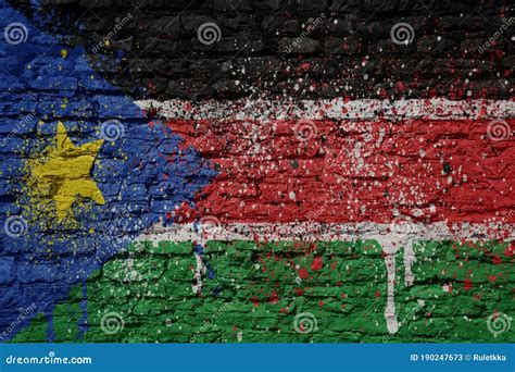 Painted Big National Flag Of South Sudan On A Massive Old Brick Wall