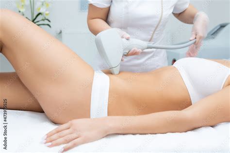 Laser Hair Removal For A Girl In The Bikini Area Stock Photo Adobe Stock