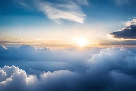 Premium Photo | A sunset over the clouds with a plane flying above the clouds.