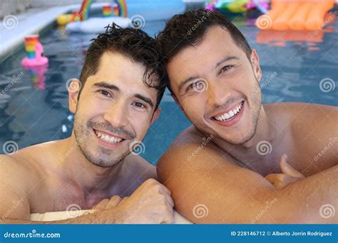 Gorgeous Interracial Gay Couple In Swimming Pool Stock Photo Image Of