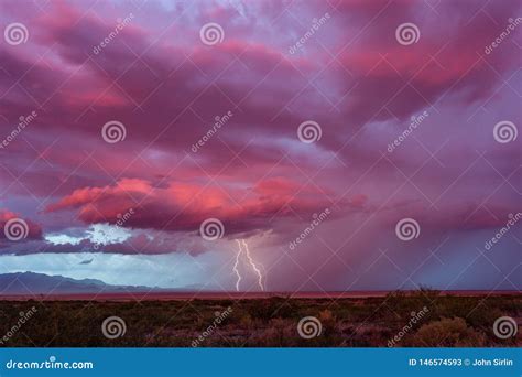 lightning bolts strike   distant storm stock image image