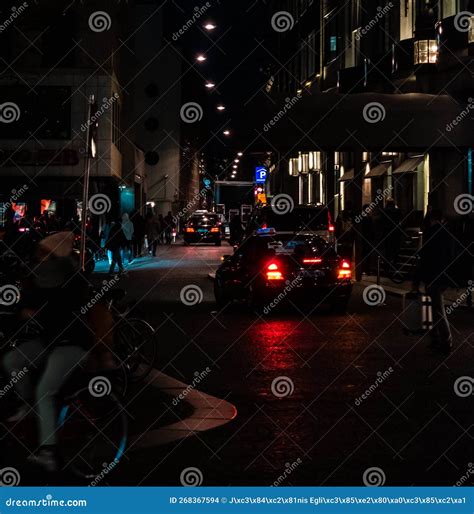Street of Amsterdam during the Night. Tourists, Coffe Shops, Bicycle