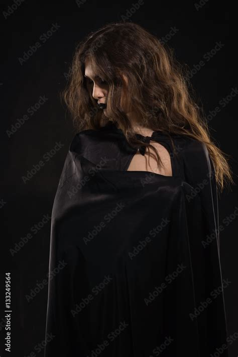 Beautiful Naked Gothic Girl In A Black Cloak Stock Photo Adobe Stock