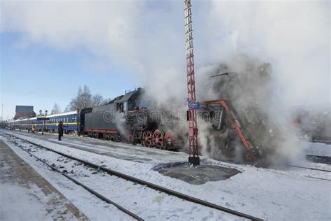 Old Soviet Steam Locomotive Of Series `lv` With Tourist Retro Train