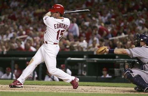 St. Louis Cardinals' outfielder Jim Edmonds played first base Sunday for the injured Albert ...