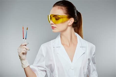 Premium Photo Female Doctor With Brown Hair And Nude Make Up Wearing White Medical Uniform