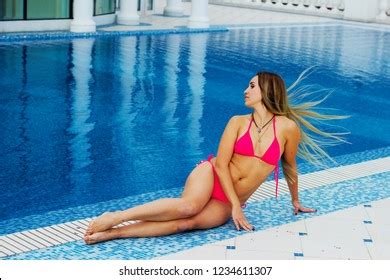 Sexy Blondehaired Woman Pink Bikini Sitting Stock Photo 1234611307 Shutterstock