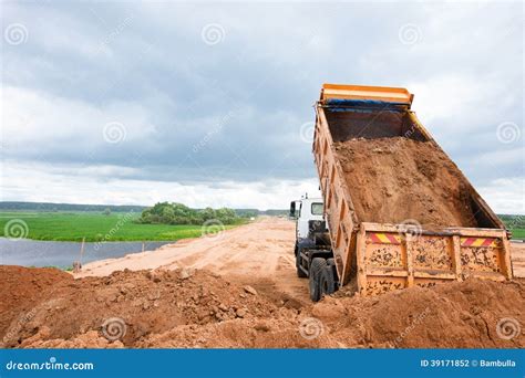 Dumper Truck Unloading Soil Stock Photo Image Of Blue Paving