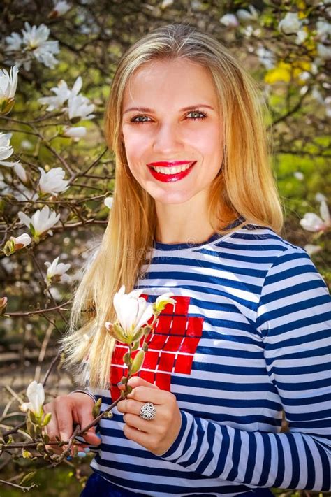 Beautiful Blonde Is Smiling In A Blooming Garden Stock Photo Image Of Glamour Beauty