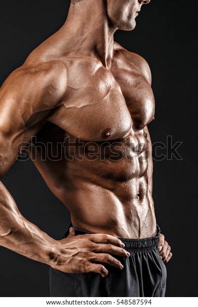 Beautiful Naked Male Torso Against Black Stock Photo Edit Now