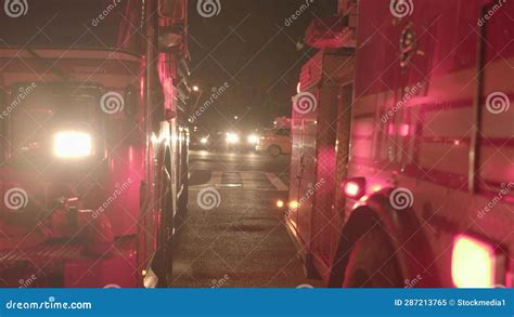 Fire Department Service Truck With Flashing Siren Lights At Night Stock