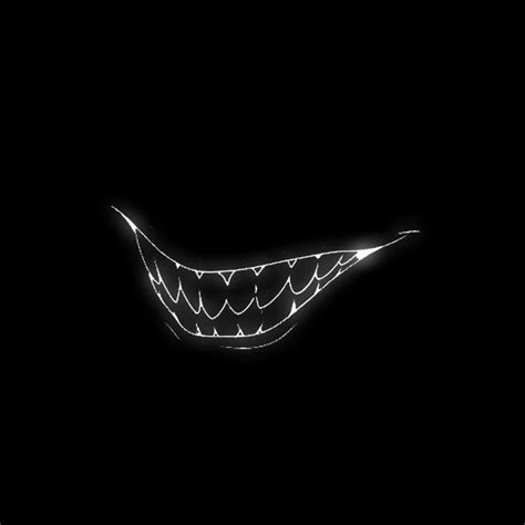 An Image Of A Scary Face In The Dark With Light Coming From It S Mouth