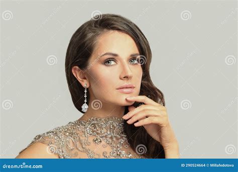 Gorgeous Jewelry Model Wearing Diamond Earring On White Cute Woman Brunette Fashion Beauty