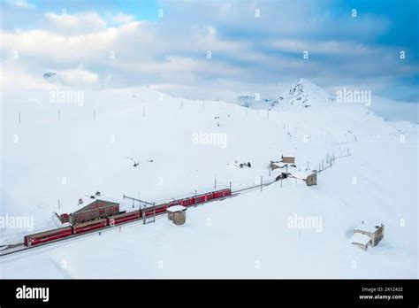Aerial View Of The Famous Bernina Express Passing Through At Bernina